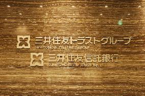 Sumitomo Mitsui Trust Group signboard and logo